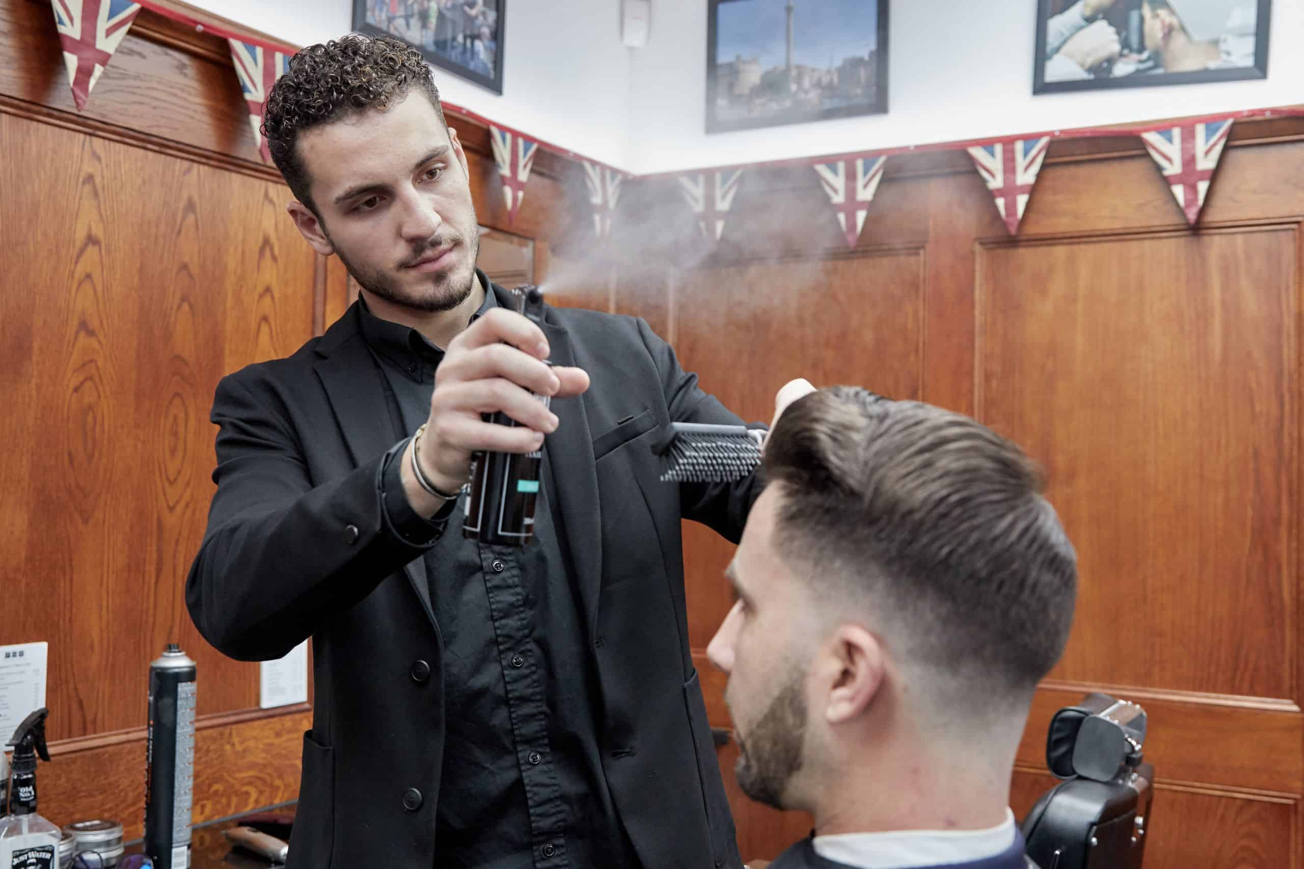 Photo & Art Print Bearded man getting long beard haircut with clipper